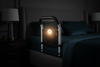 Bedside handrail with LED glow, dark moody bedroom