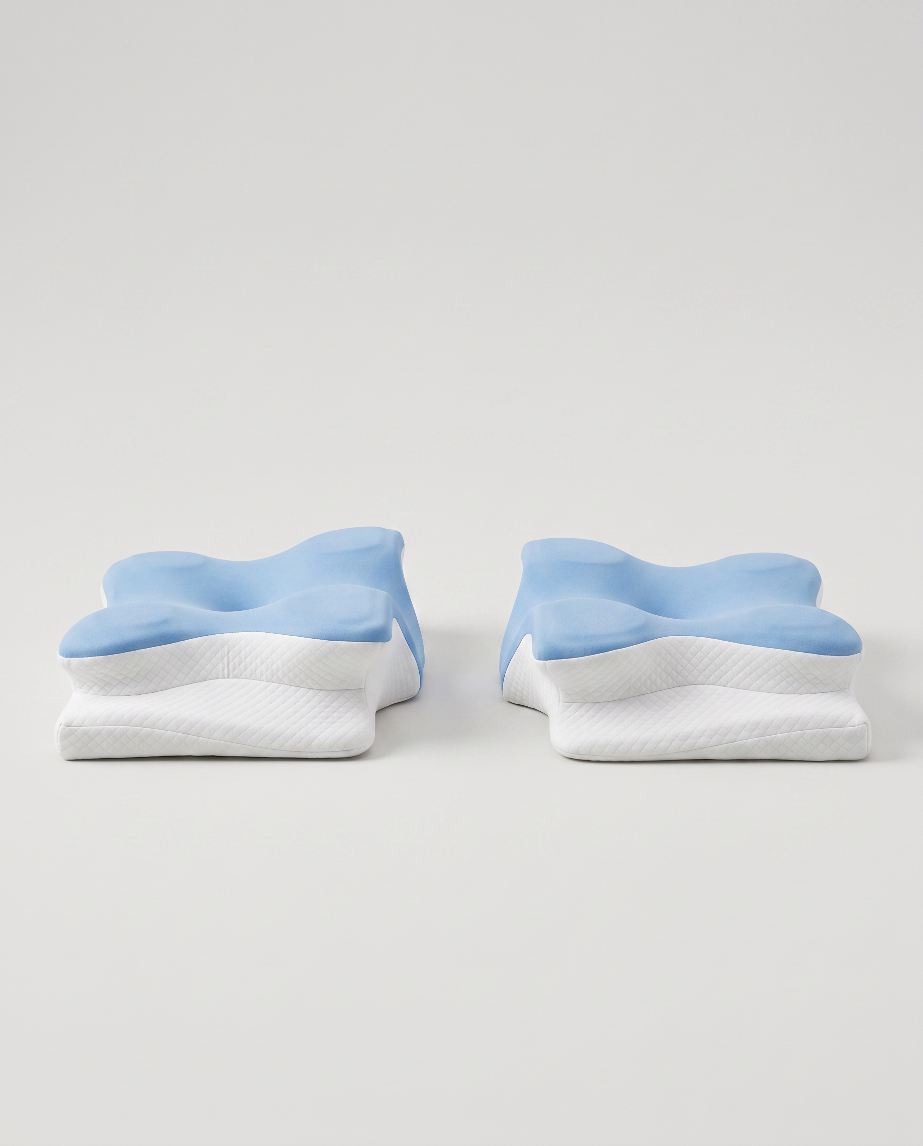 Two Helpfect butterfly memory foam pillows in blue, shown side by side from the front